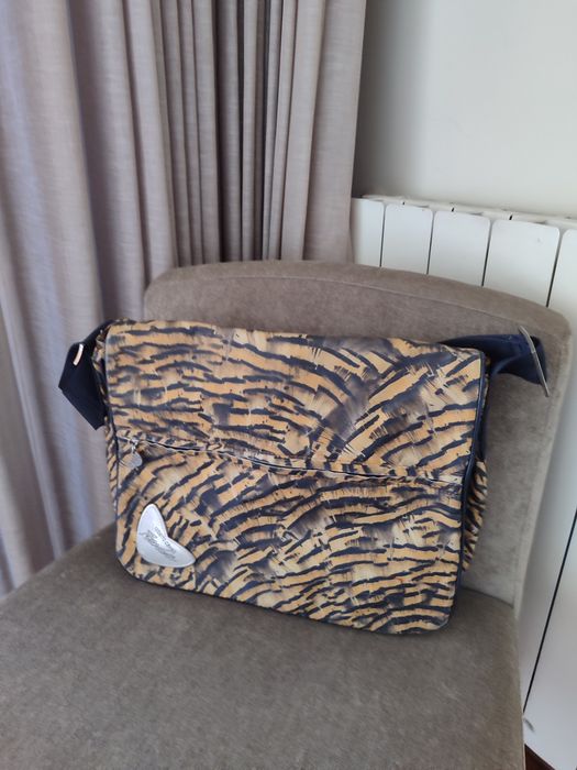 Vendo saco da Marca Roberto Cavalli.