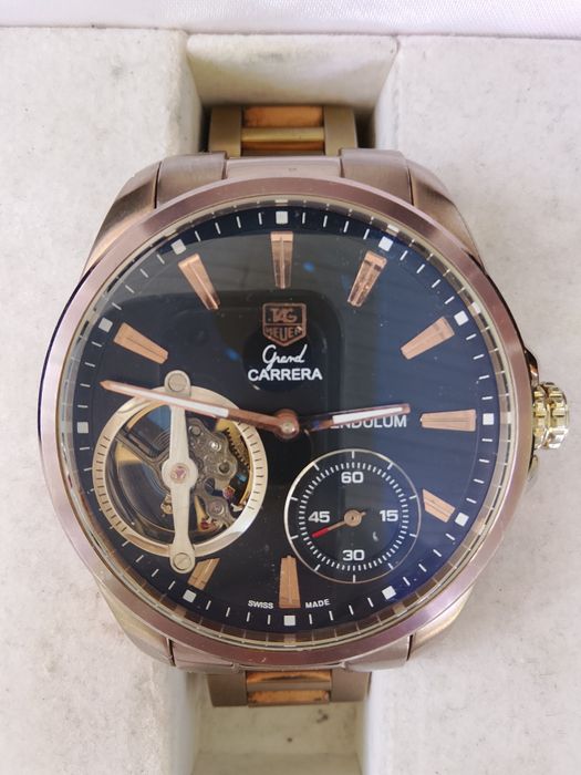 Часы механические Cartier Roadster.