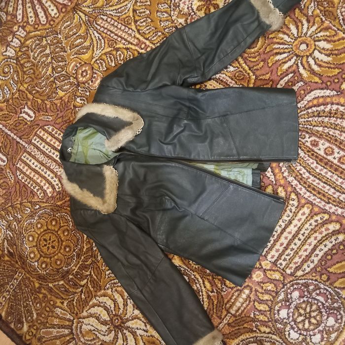 Кожаний костюм женский