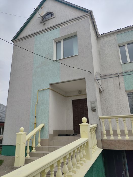 Будинок, гараж, земельна ділянка 10 соток