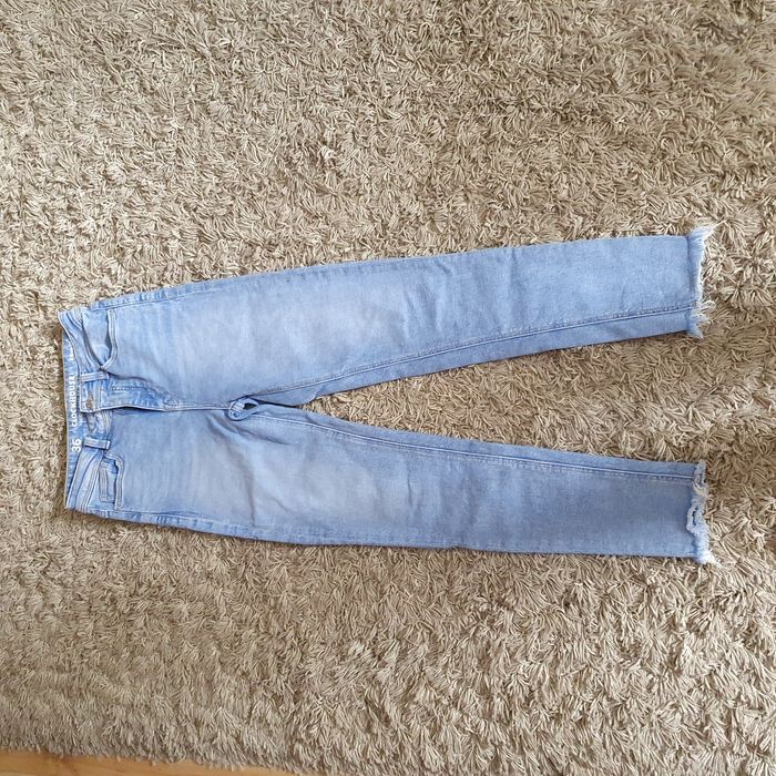 Spodnie jeans z wysokim stanem clockhouse jak nowe