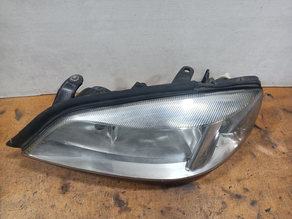 Farol Opel Astra G ótica 1999 esquerdo