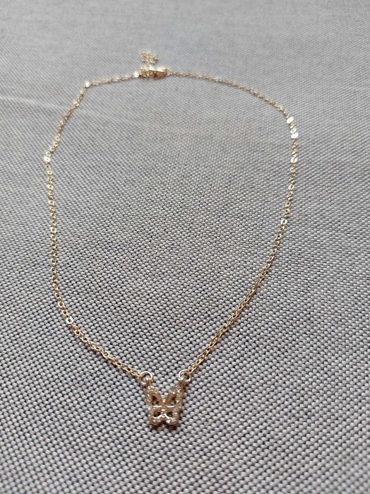 Pozłacana celebrytka z motylkiem i cyrkoniami