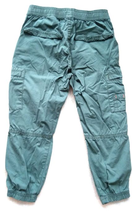 Spodnie H&M  przeciwdeszczowe rainwear chłopięce zielone rozmiar 110cm