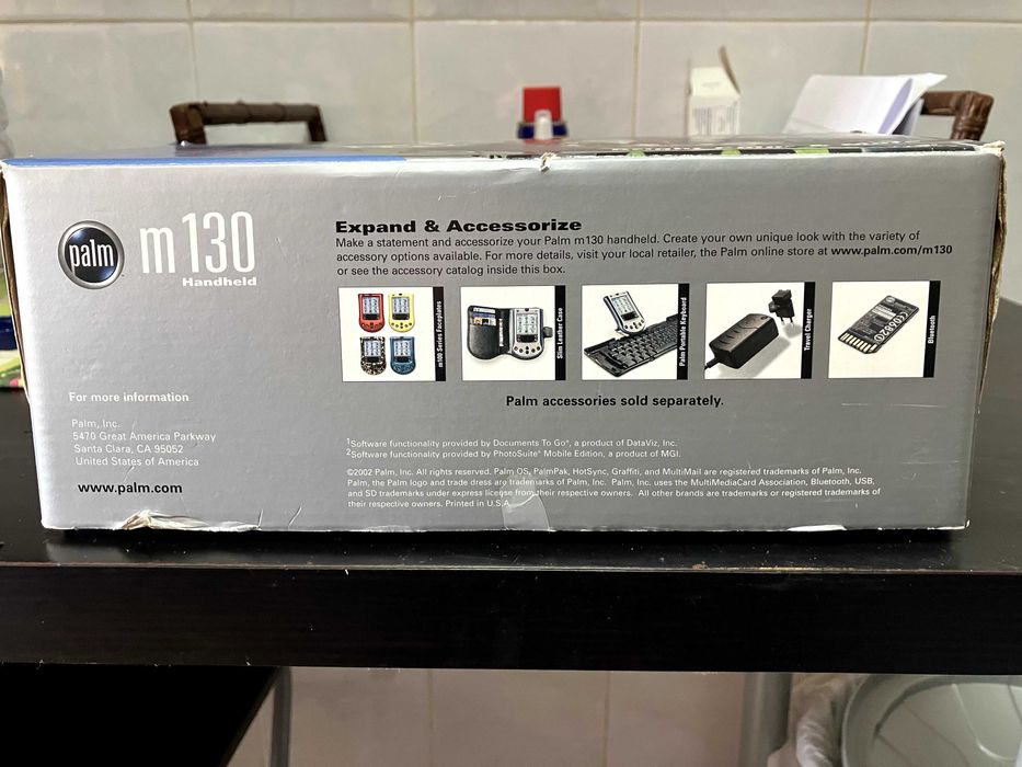 Palm M130 com carregador, caixa , dock e software,  precisa de bateria