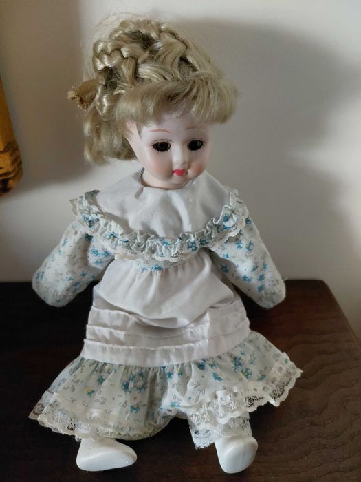 Boneca de porcelana64584497309569122