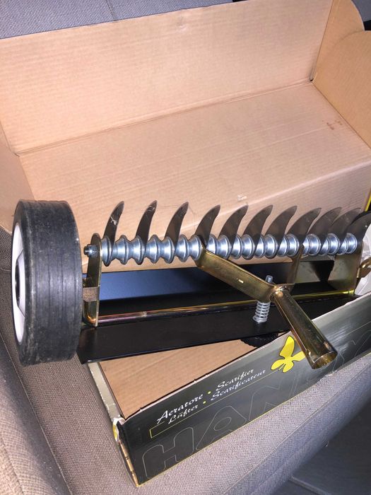 Escarificador de relva ( Novo)