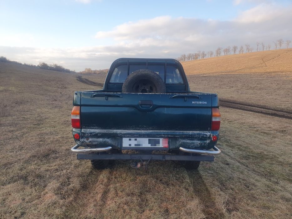 Міцик Л200, лівий руль, на повному бойовому