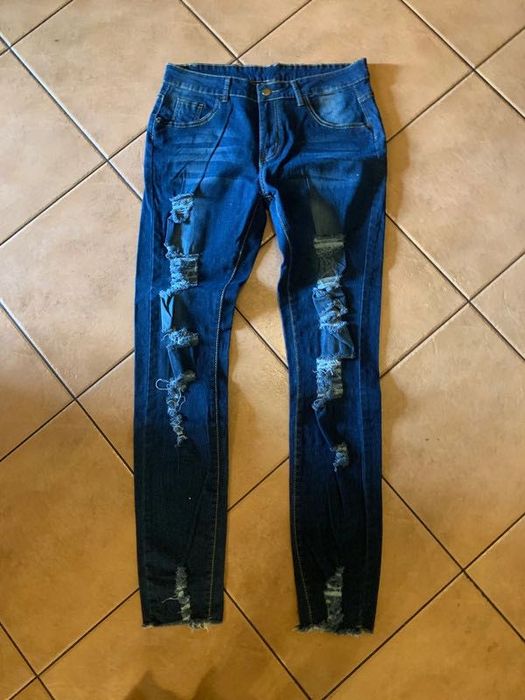 Spodnie z dziurami przecieranie jeansy granatowe damskie 40 L