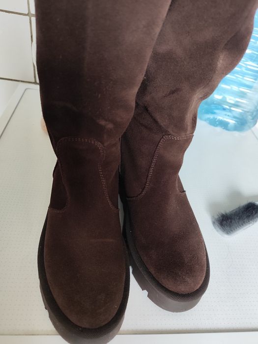 Сапоги високі,труби без замків на широку ногу