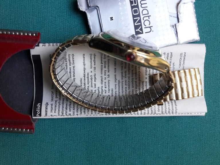 Swatch Irony, malha dourada, com estojo.  Nova Baixa de preço