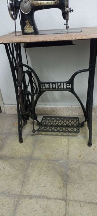 Máquina costura singer