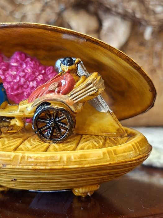 Miniatura antiga de carregador Japonês em celuloide