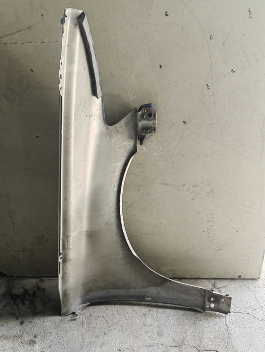 Guarda lamas esquerdo Volvo V50/S40