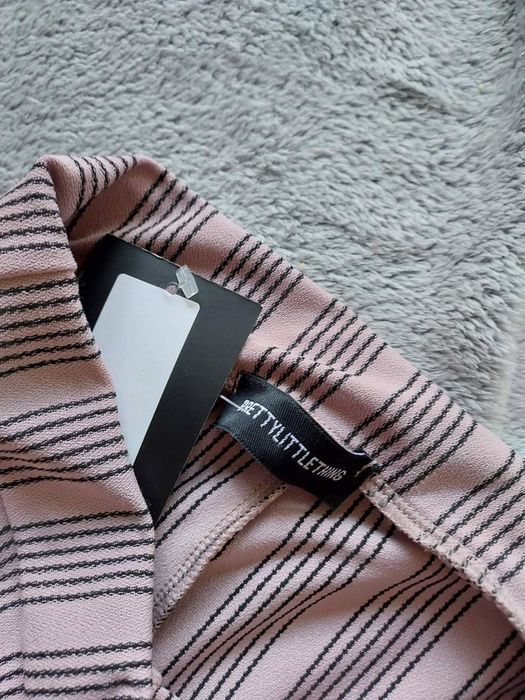 Spodnie dzwony NOWE XS pudrowy róż