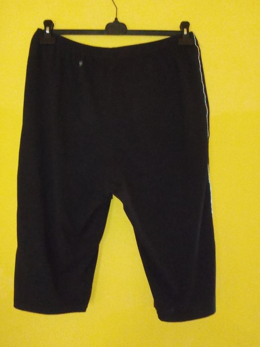 Czarne rybaczki ze srebrną wypustką , elastyczne 42/44