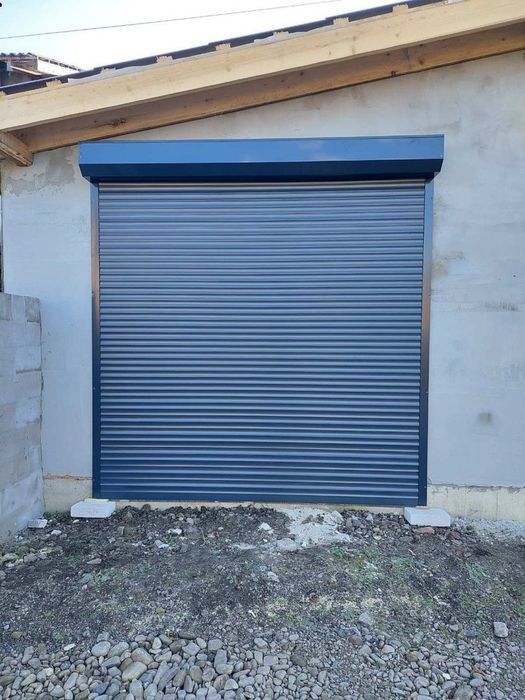 Секційні гаражні ворота / ролети / автоматика