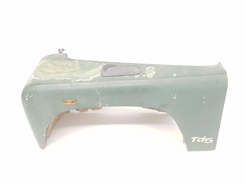 GUARDA-LAMAS FRONTAL ESQUERDO LAND ROVER DEFENDER STATION WAGON 1999 -