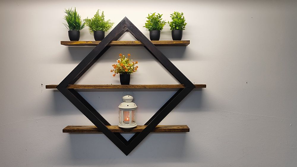 Prateleira/Floreira flutuante em forma de diamante.