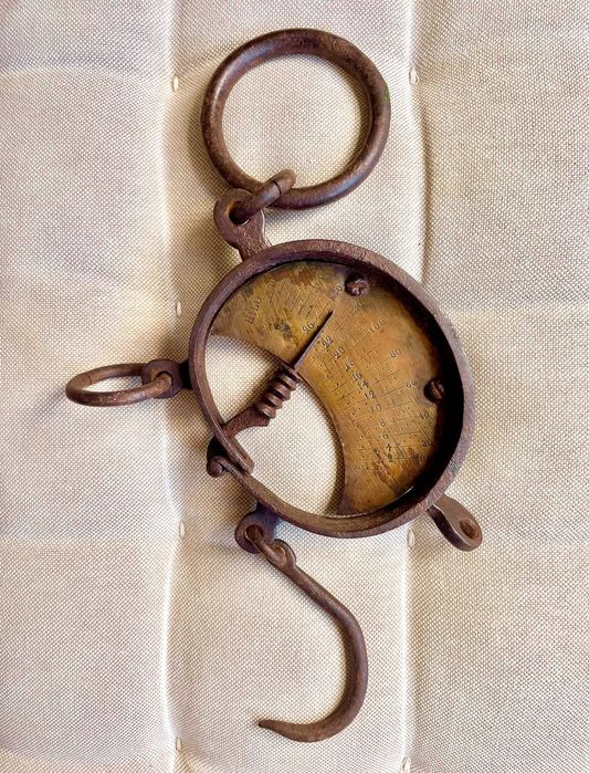 Instrumentos antigos de peso e de medida