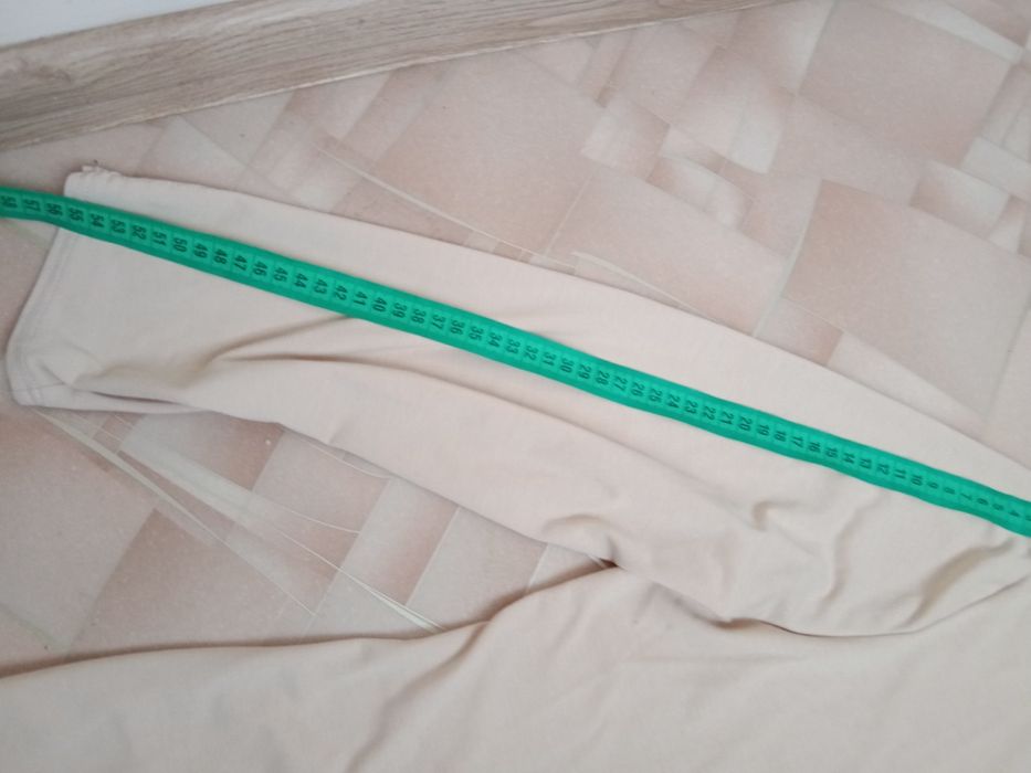 Кофта на завязках,размер 56.Бежевого цвета.