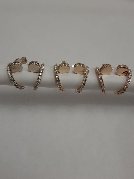 Золотые серьги Cartier гвоздь с бриллиантами 1.02 ct