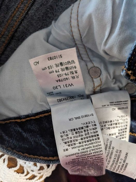 Spodnie jeansowe Levis 501 W31 L30 przecierany granatowy