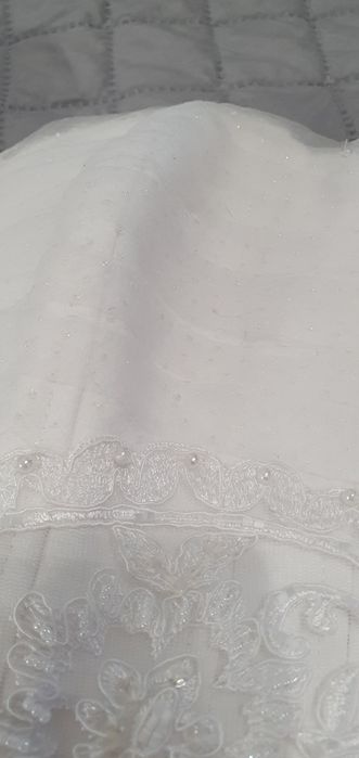 Suknia ślubna gorsetowa z wiązaniem i kropeczkami