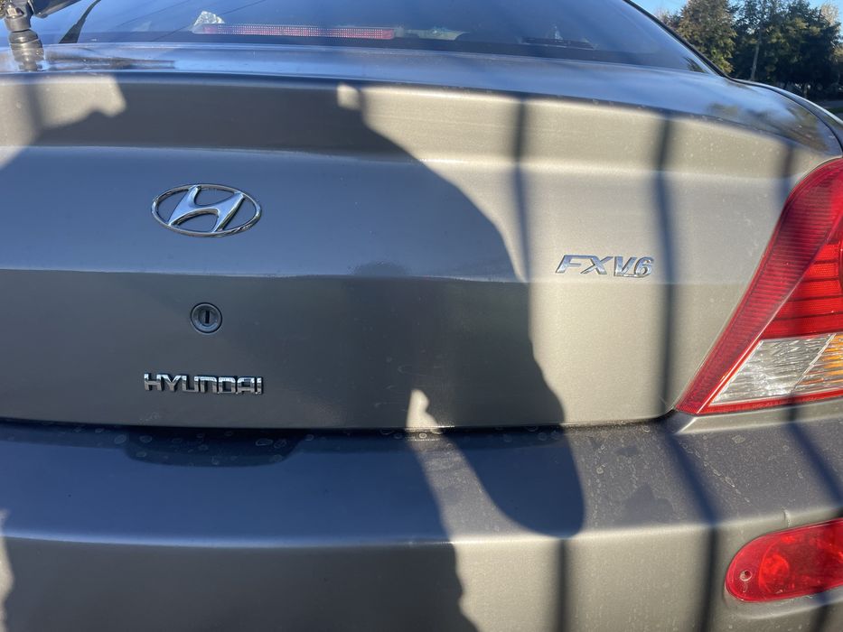 Hyundai Coupe 2006 VIN KMHHN61FP6U213796 фото оголошення 9 з 19