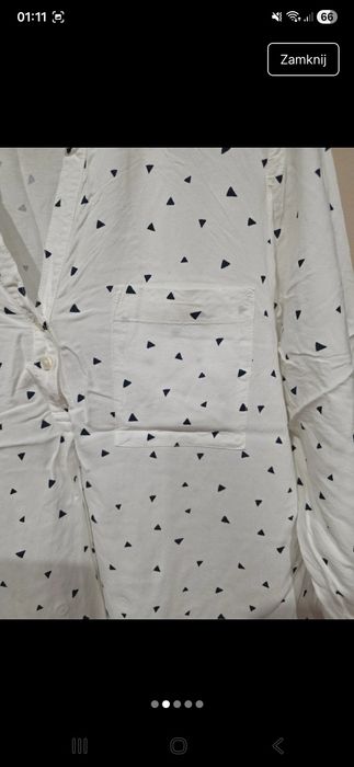 Biała bluzka na guziki w trójkąty