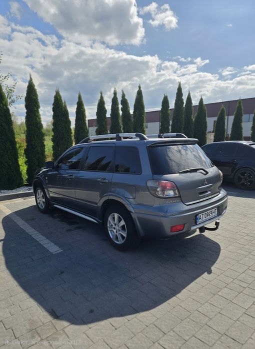 Оутлендер  2,4 газ бензин