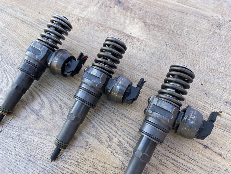 Насос форсунка 1.9 tdi bls VW Passat B6 VW Golf 5 VW Caddy 038130073BN