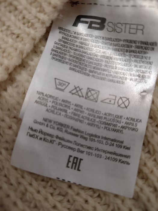 Kremowy sweter News Yorker róż.L/40