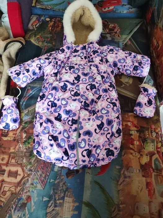 Продам комбінезон -конверт дитячий для дівчинки 700 грн