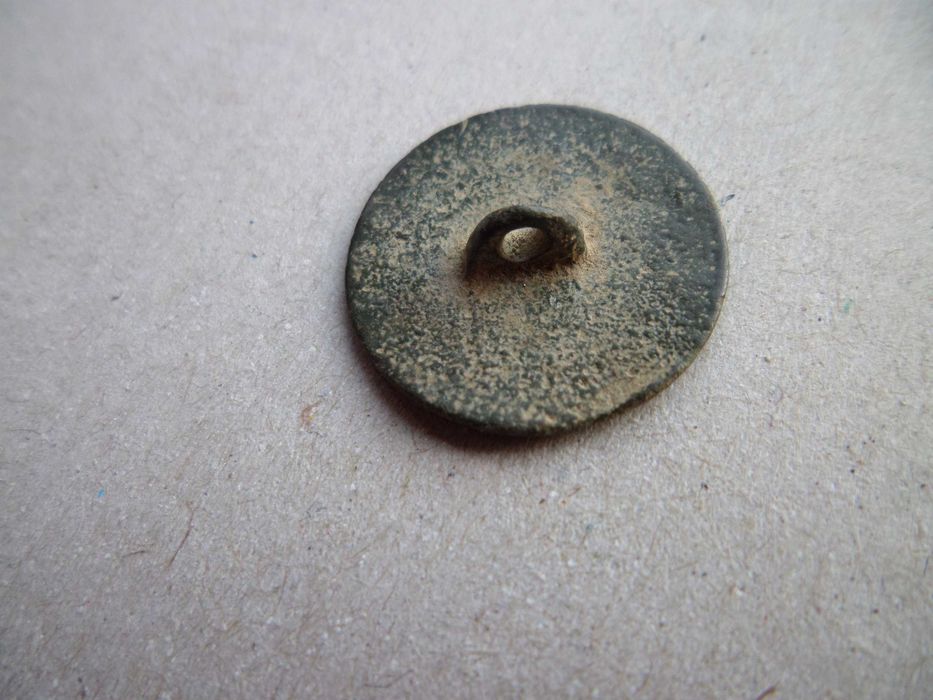 Botão antigo em Metal