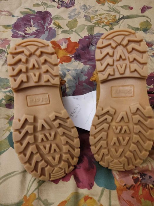 Botas de menino -no as