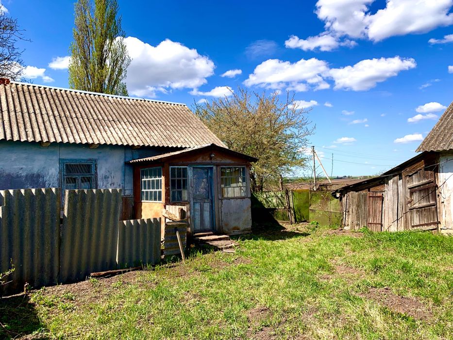 Земельна ділянка з будинком