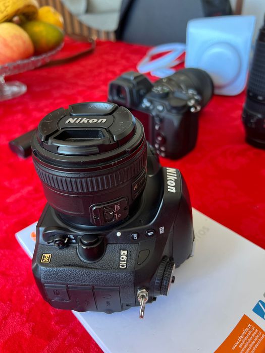 Câmara Nikon profissional + lente 50mm.