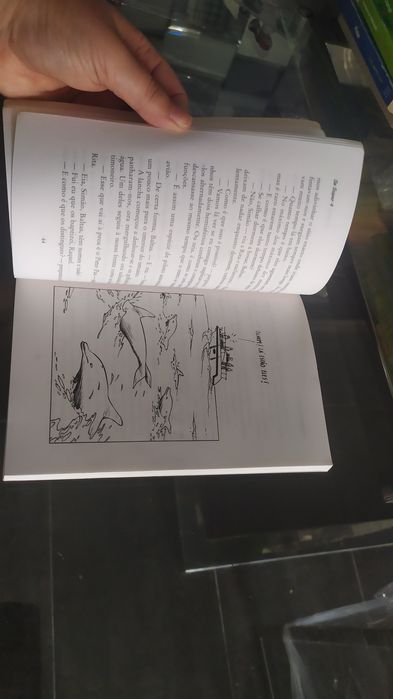 Livro os super 4 a canção do golfinho