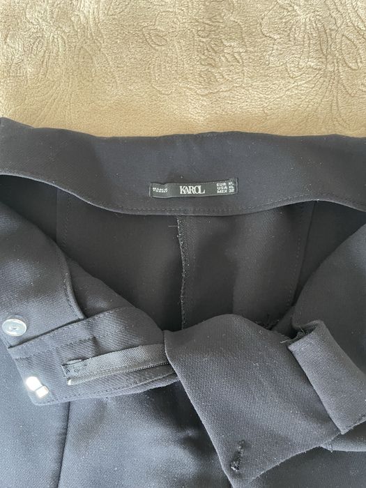 Брюки з високою посадкою