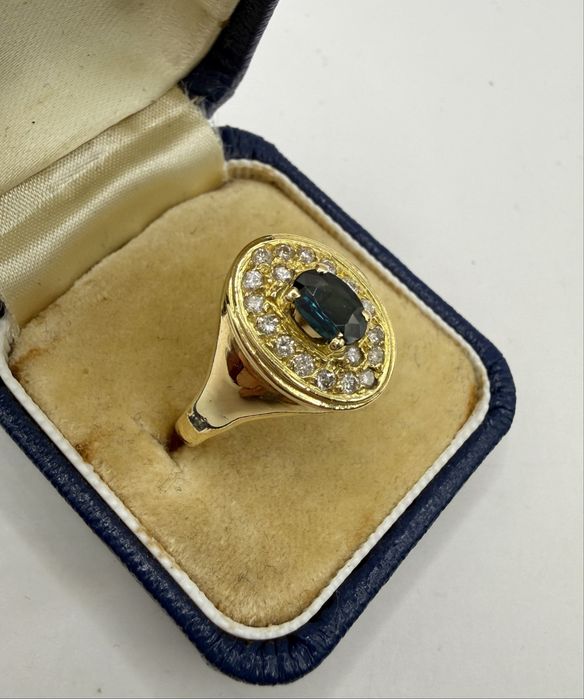 Złoty pierścionek 750 z szafirem 0,50ct i diamentami 0,25ct