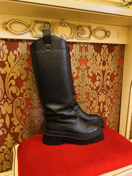 Шкіряні чоботи …….