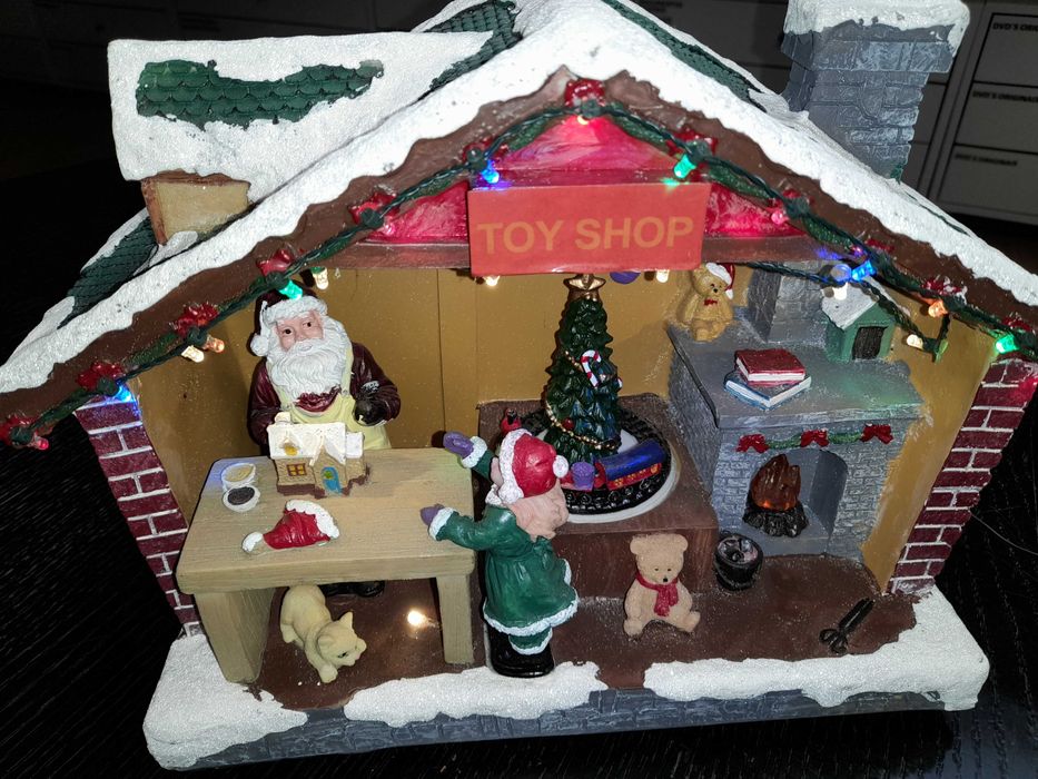 Casa  do Pai Natal em resina com Luz + Musica e Movimento. Usada