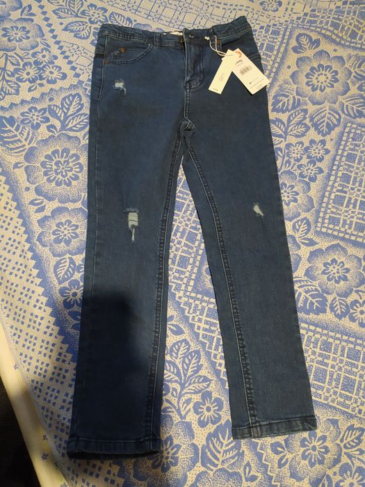 Джинсы новые для девочки
