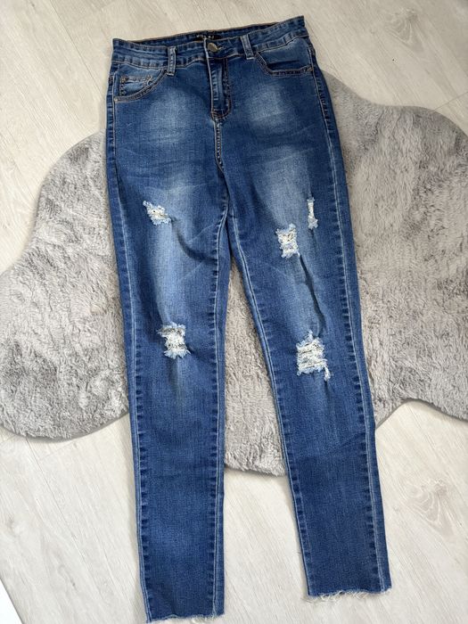 jeansy skinny przetarcia dziury granatowe M