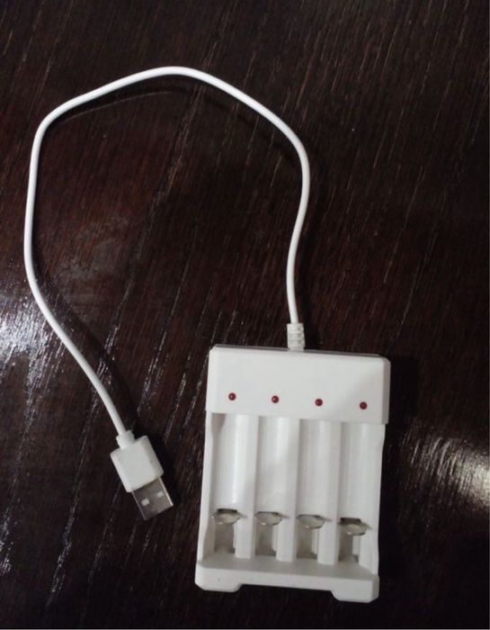 Продам зарядку для батарейок