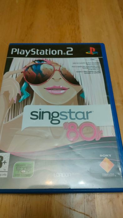 Pack SingStar PS2 — 4 jogos + 2 microfones USB