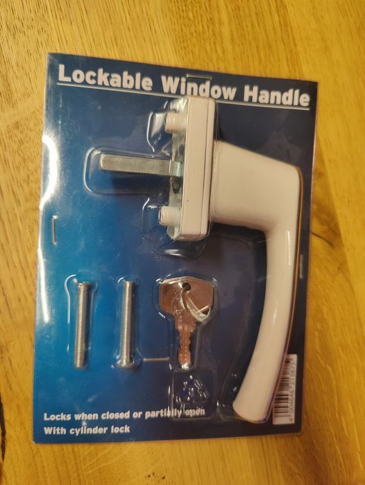 Klamka okienna z zamkiem nowa w opakowaniu