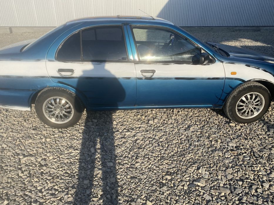 Продаж нісан альмера