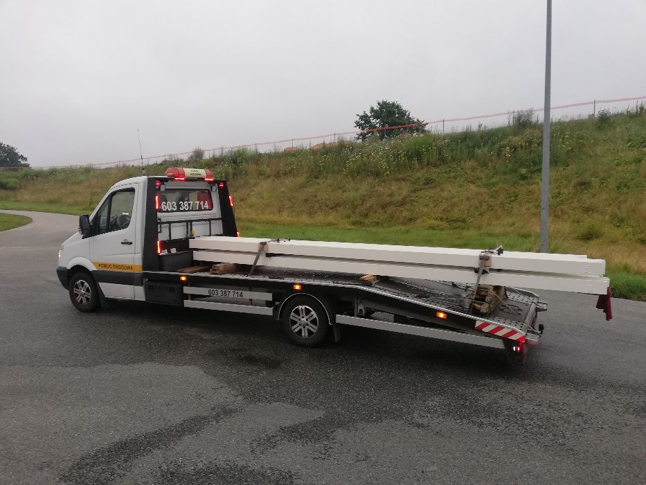 Przewóz Pojazdów Maszyn Autolaweta Laweta Pomoc Drogowa Polska UE